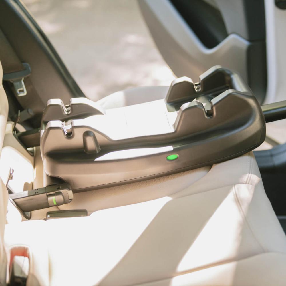 Tavo pet protection vehicle base in the back seat of a car connected to the anchor latch points.